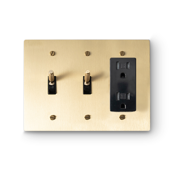3 Gang 2 Toggle Switches & 1 Duplex Outlet - Brass plate, Brass screws - Front view